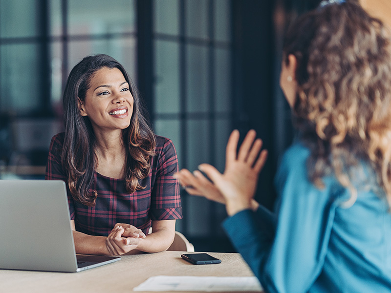 Businesswomen talking in the office