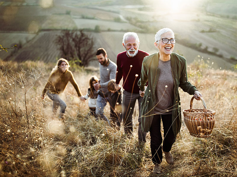 Multi-generational family, happily hiking||||