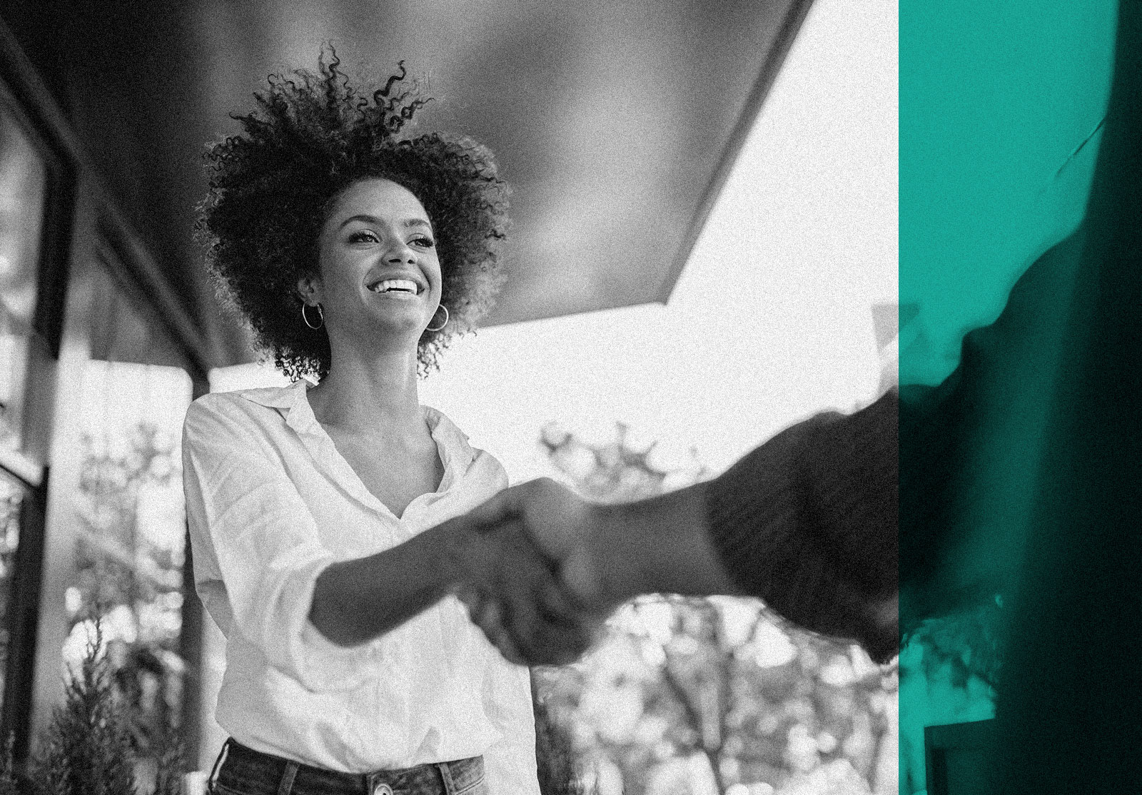 Woman shaking hands with another person