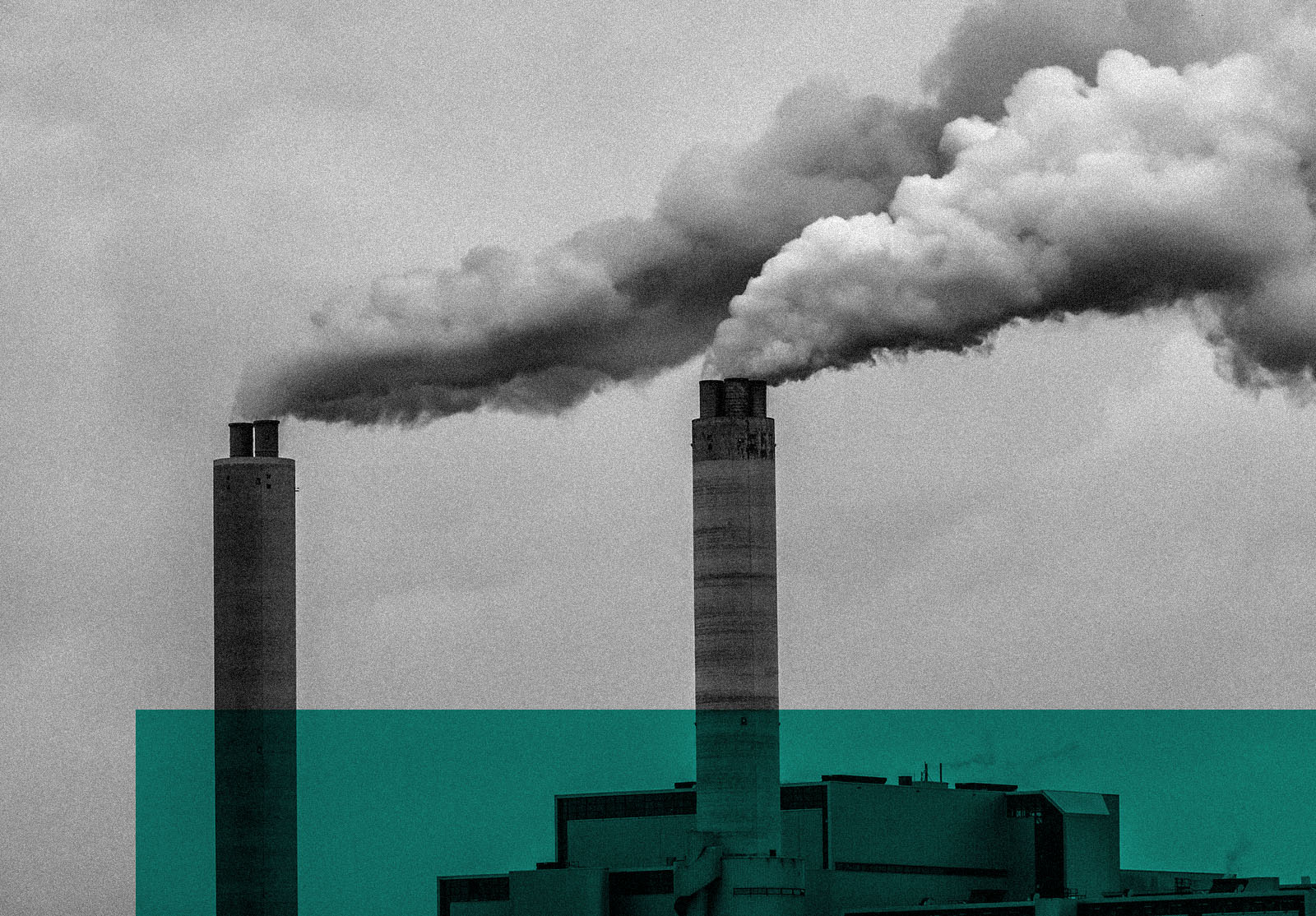 Chimneys and dark smoke coming out of a factory