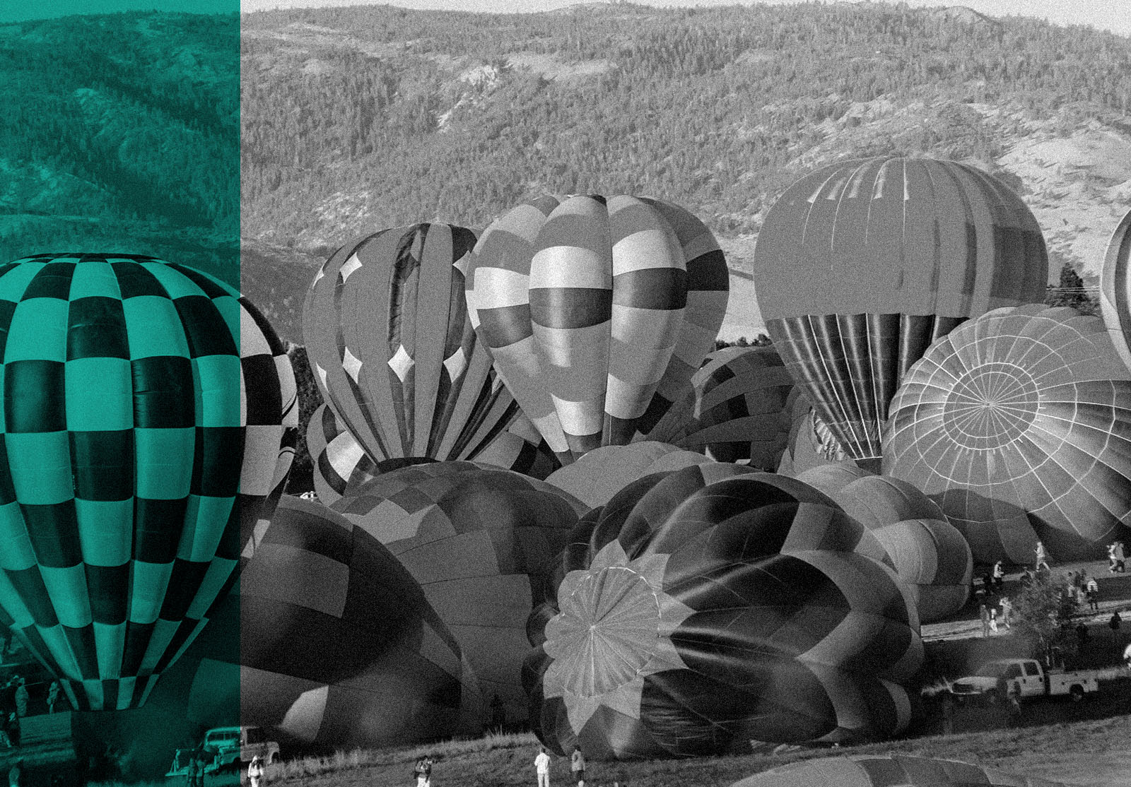 A sea of color as hot air ballons are being inflated in preparation for a mass ascension