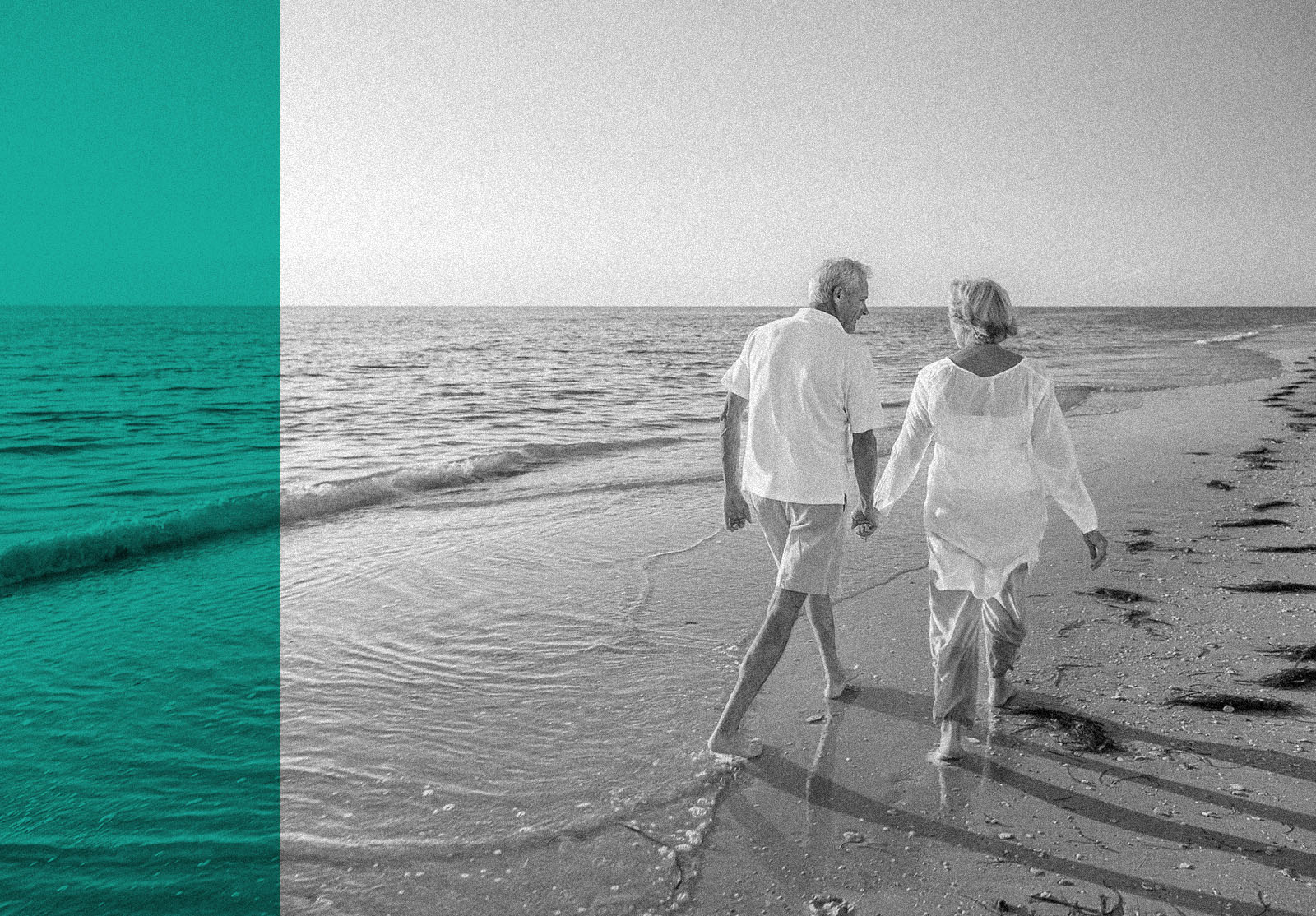 Happy senior man and woman old retired couple walking and holding hands on a beach at sunset