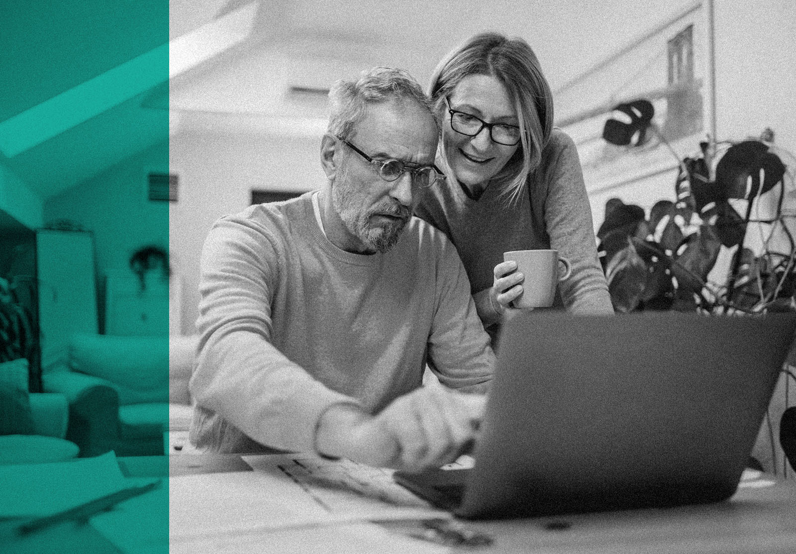 Happy senior couple laughing and bonding while using laptop at home. Smiling elderly husband and wife having fun satisfied with buying insurance, paying bills online. Man showing something on laptop.