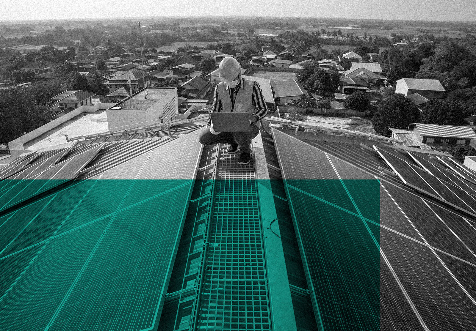 Technician checks the maintenance of the solar panels on the roof.