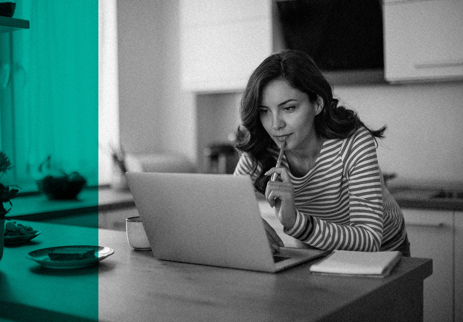 Young woman looking at retirement plan on her laptop at home